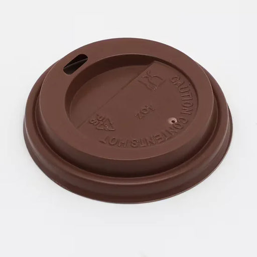 Brown coffee cup lid with text on a white background