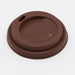 Brown coffee cup lid with text on a white background